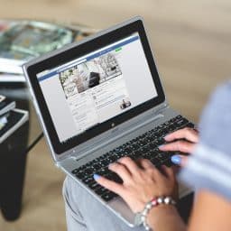 woman using laptop at home